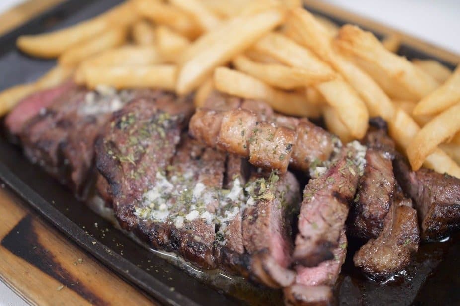 Brazilian sirloin cap on a sizzling skillet
